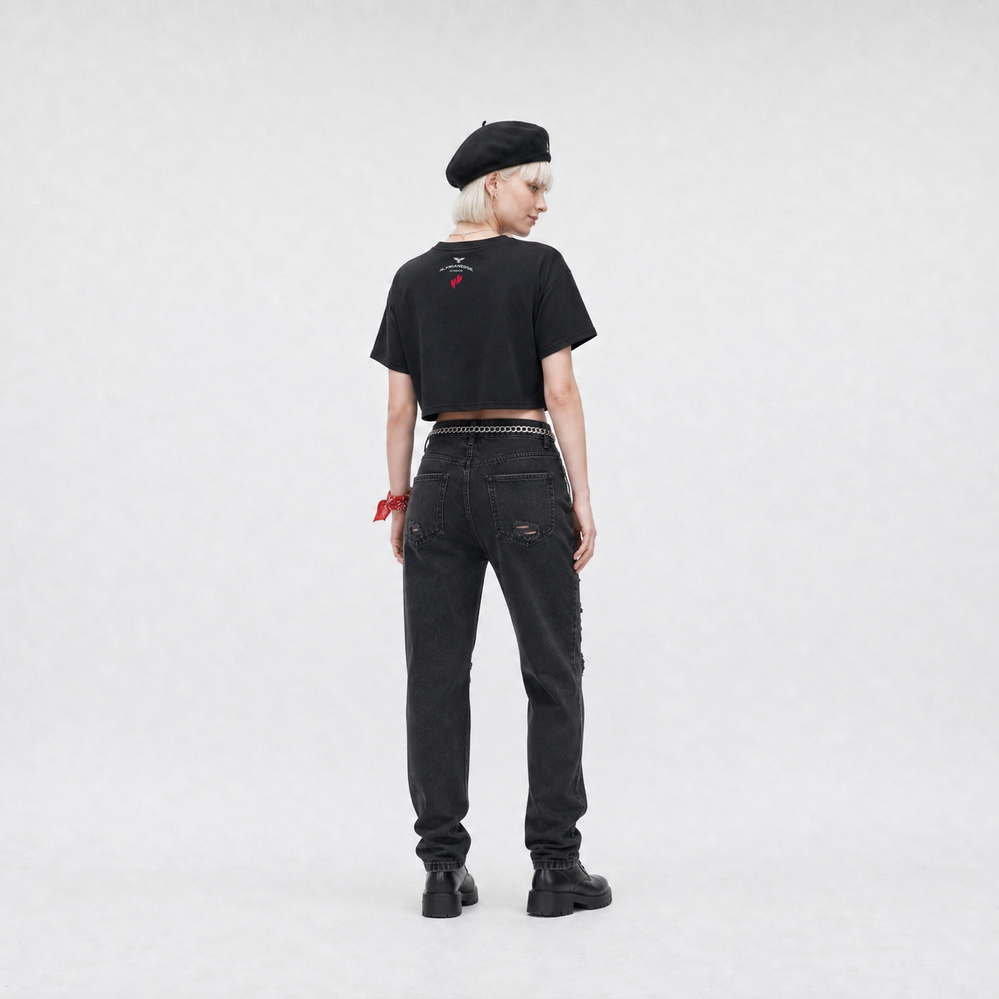 Person wearing a black t-shirt and jeans on a white background