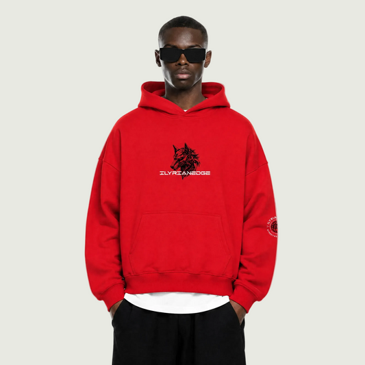 Person wearing a red hoodie with a logo on a white background