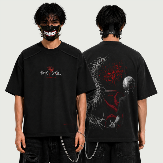 A model shown from the front and back wearing a black short-sleeve T-shirt with Tokyo Ghoul graphics. The front features the Tokyo Ghoul logo in white and red on the chest, while the back displays a large graphic of a skeletal monster and a character with white hair in red, black, and white.